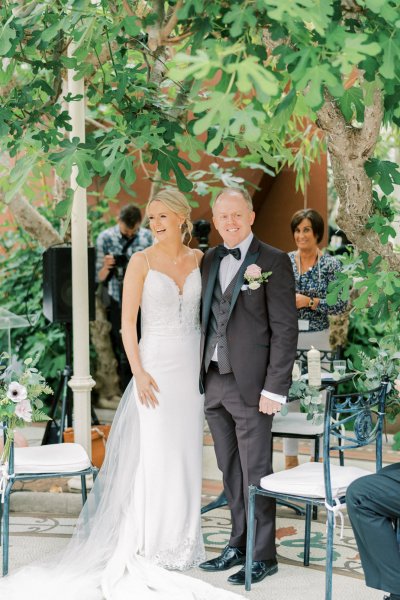 Bride groom stand at wedding ceremony vows