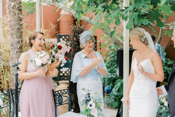 Guests bridesmaid bride clap celebrate