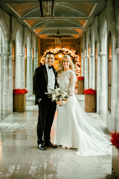 Bride groom interior venue flowers bouquet