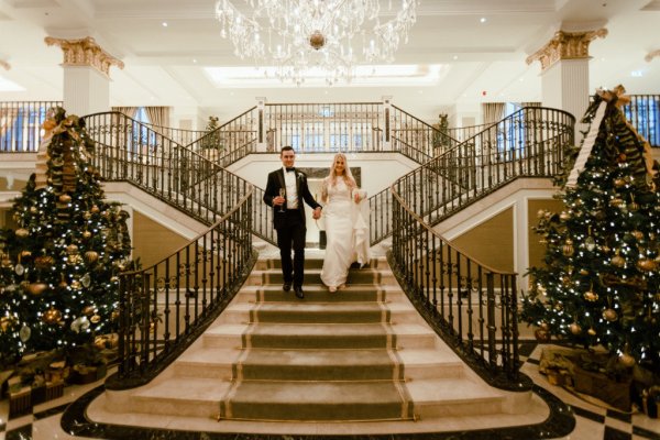 Bride groom walking down stairs