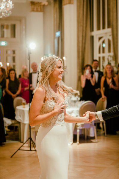 Bride in dining room guests