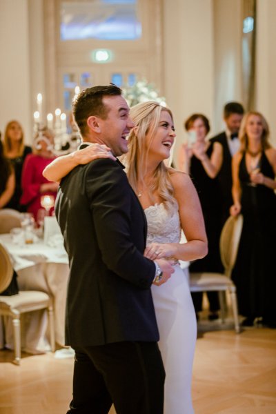 Bride groom hug wedding room dancing