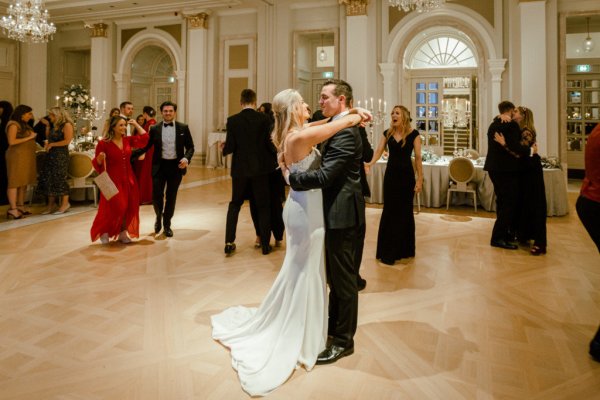 Bride groom hug wedding room dancing