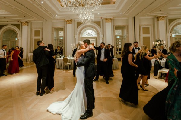 Bride groom hug wedding room dancing