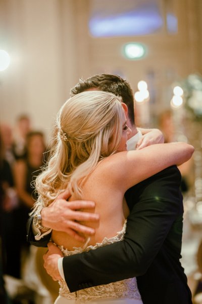 Bride groom hug wedding room dancing