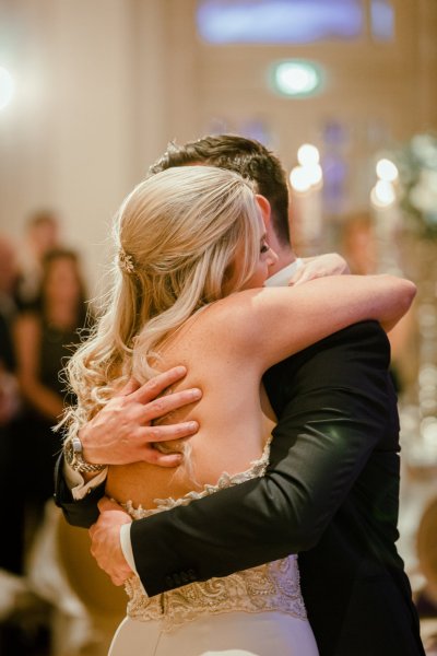 Bride groom hug wedding room dancing