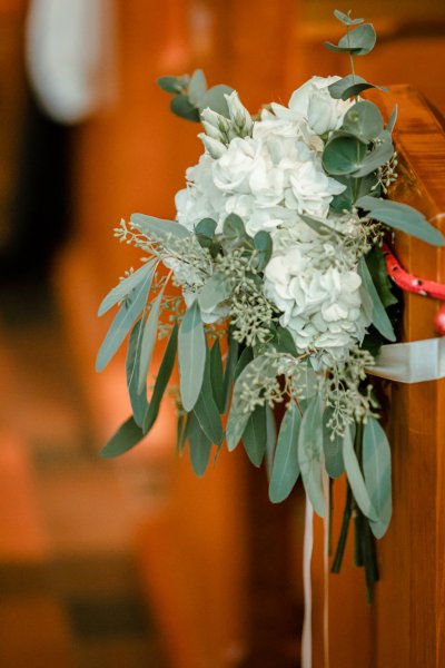 Church pew flowers