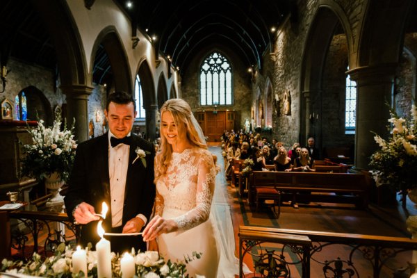 Bride groom alter church guests priest