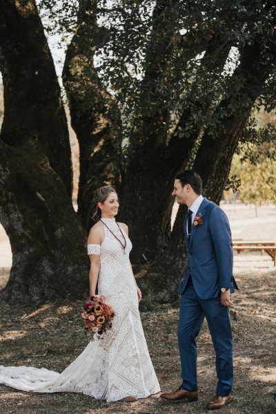 first lookBride groom forest park tree sunshine bouquet flowers hay field