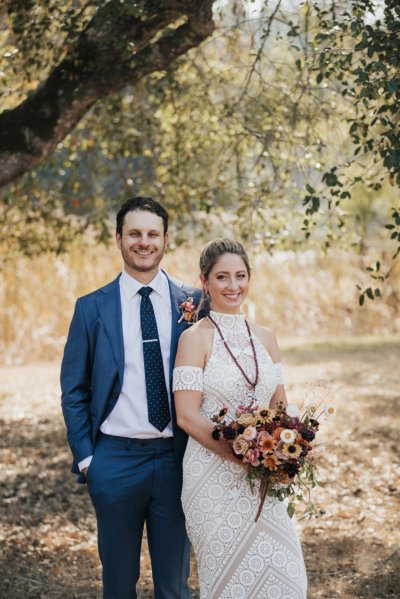 Bride groom forest park tree sunshine bouquet flowers hay field