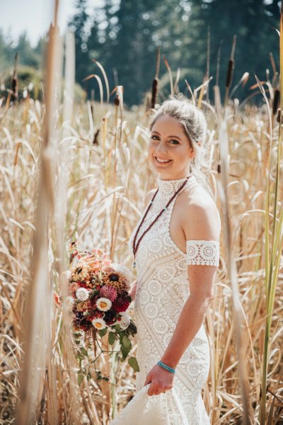 Bride forest park tree sunshine bouquet flowers hay field