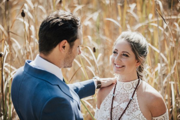 Bride groom forest park tree sunshine bouquet flowers hay field