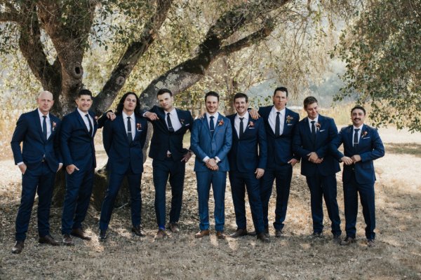 Groom groomsmen suit tie park forest