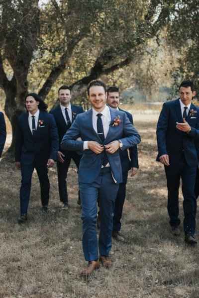 Groom groomsmen suit tie park forest