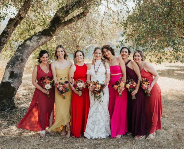 Bridesmaids bride holding bouquet of flowers