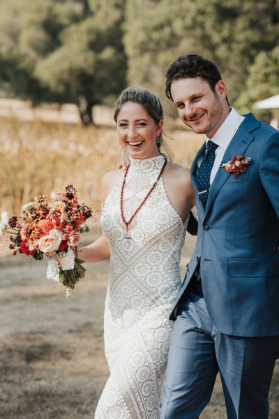 Bride groom flowers bouquet smiling couple