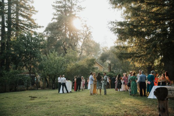 Guests outside sunset evening shot park forest exterior