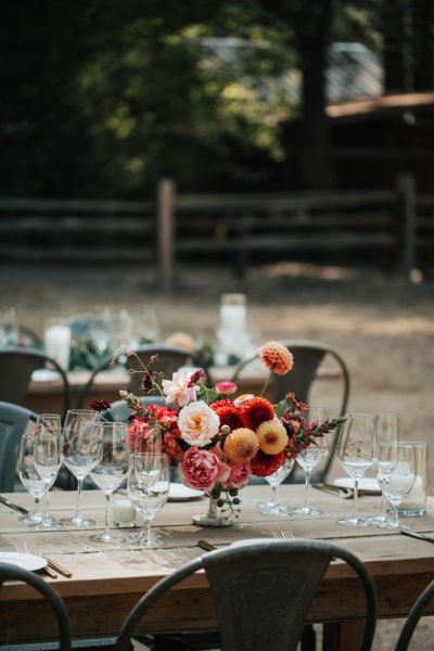 flowers roses on table plates cutlery