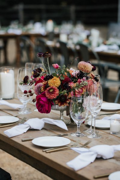 flowers roses on table plates cutlery