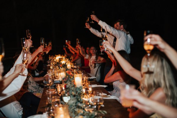 Cheers to the happy couple guests prosecco champagne