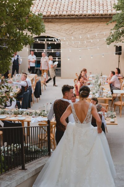 Bride groom enter ceremony dining room guests clapping