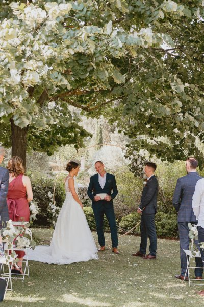 Bride groom officiant officiate wedding ceremony