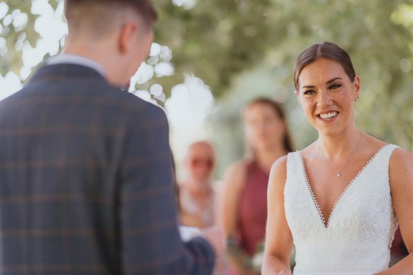 Bride groom smiles