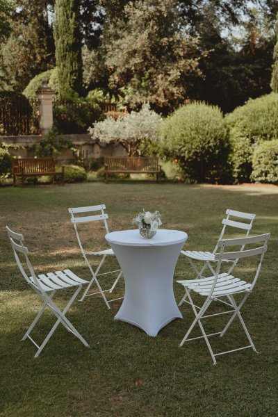 Empty setting white table and chairs