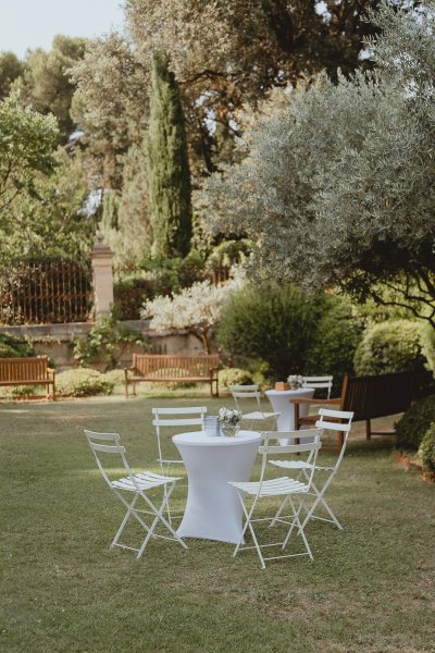 Empty setting white table and chairs