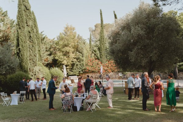 Guests gather good weather exterior