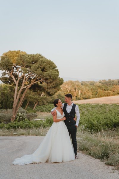 Bride and groom park road tree