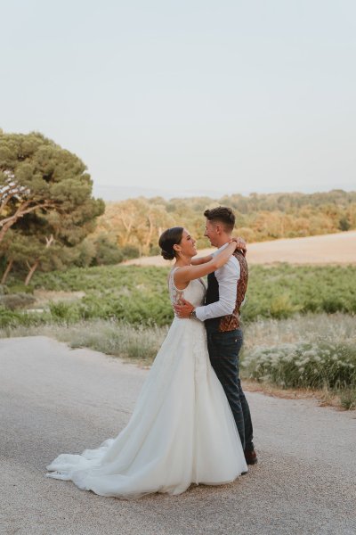 Bride and groom park road tree