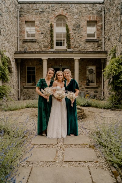 Bride and bridesmaid exterior wedding venue