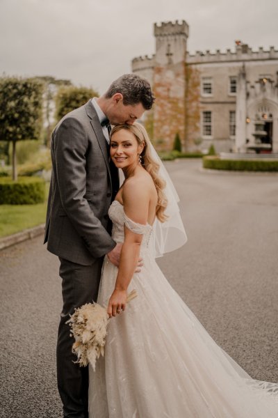 Couple after wedding ceremony bride groom bouquet flowers