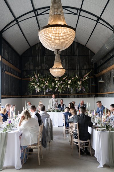 Groom making speech to guests