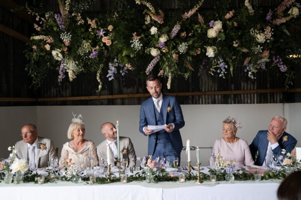 Groom making speech to guests