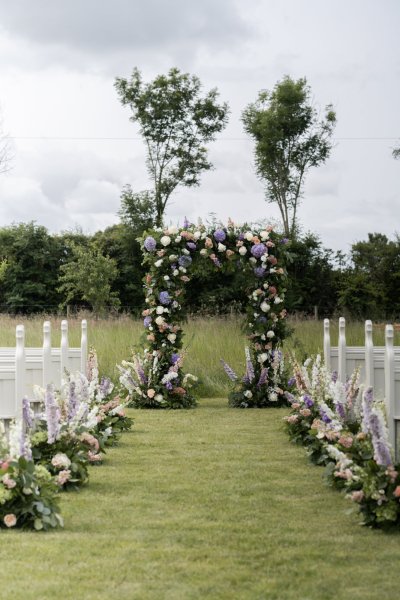 Empty ceremony seating arrangement roses flowers