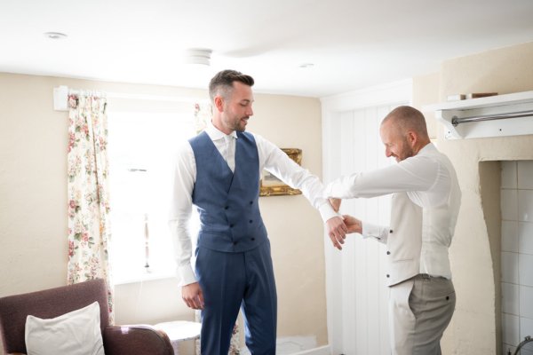 Groom getting ready before wedding ceremony