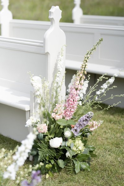 Pink flowers in garden wedding ceremony