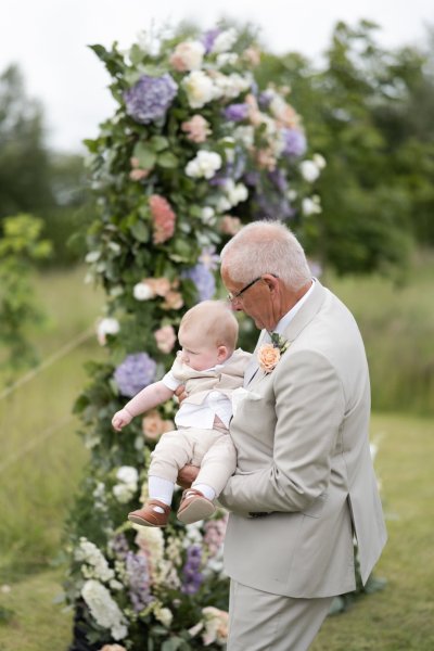 Father holding little baby