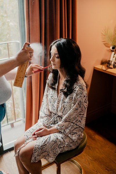 Hairspray in brides hair