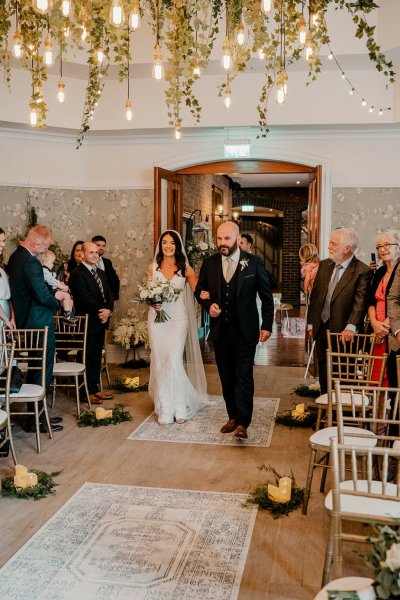 Father walks bride down the aisle