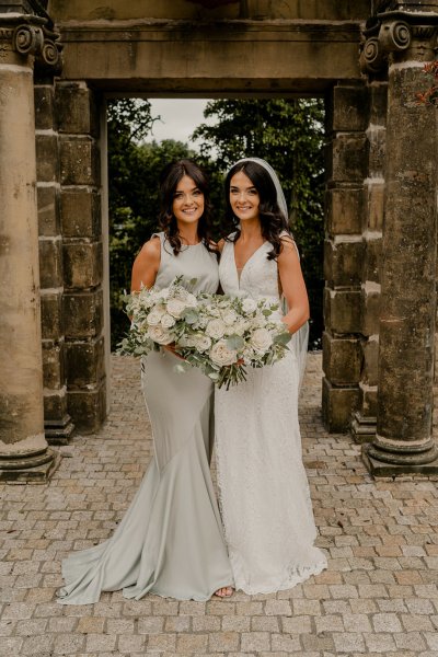 Bride and bridesmaid