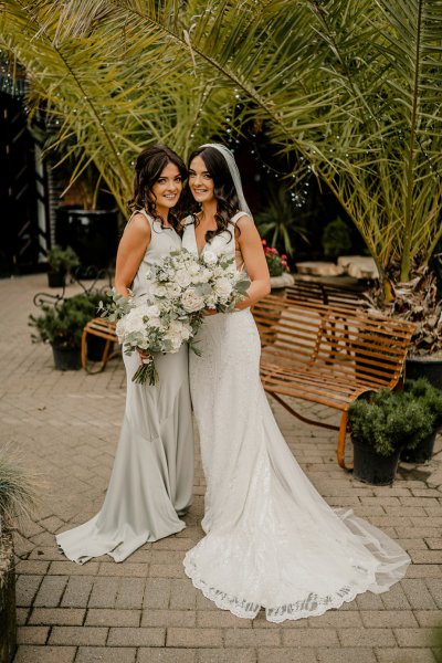 Bride and bridesmaid