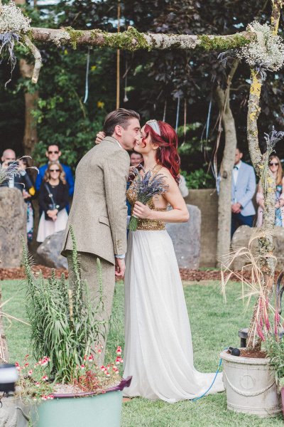 bride and groom kissing