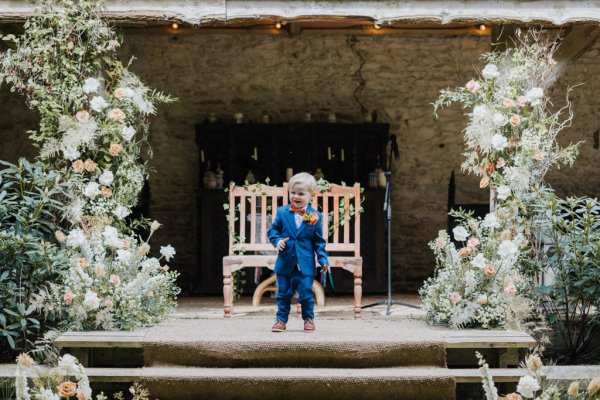 Little baby boy in blue suit