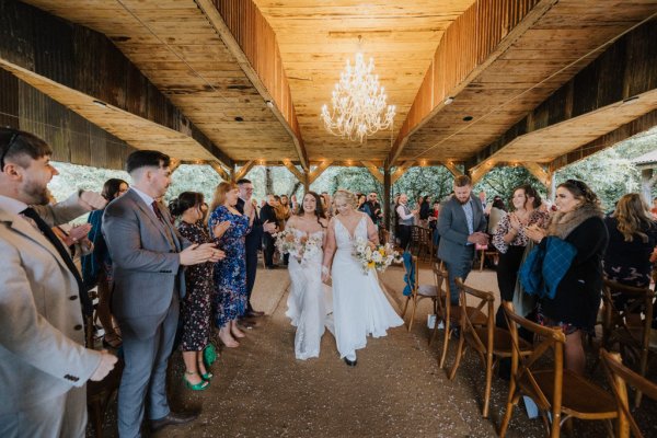 Brides wives exiting wedding ceremony