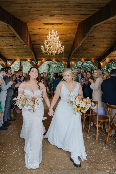 Brides wives exiting wedding ceremony