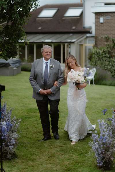 father walking bride down aisle