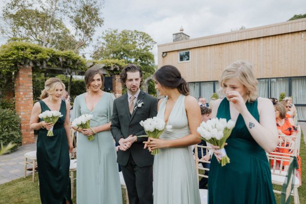 Groom bridesmaids crying